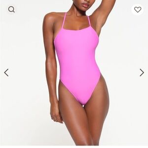 NWT Skims Cami One Piece. Color neon orchid